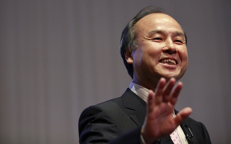 Softbank Corp President Masayoshi Son smiles during a joint news conference with Dan Hesse (not in picture), President and CEO of the Sprint Nextel Corporation, in Tokyo October 15, 2012. Japanese telecoms company Softbank Corp said on Monday it aims to take a stake of up to 70 percent in U.S. carrier Sprint Nextel Corp in a deal that could be worth up to $20.1 billion. REUTERS/Yuriko Nakao (JAPAN - Tags: BUSINESS TELECOMS EMPLOYMENT HEADSHOT) - RTR395RR