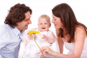 1-happy-family-with-baby-daughter-and-yellow-flower