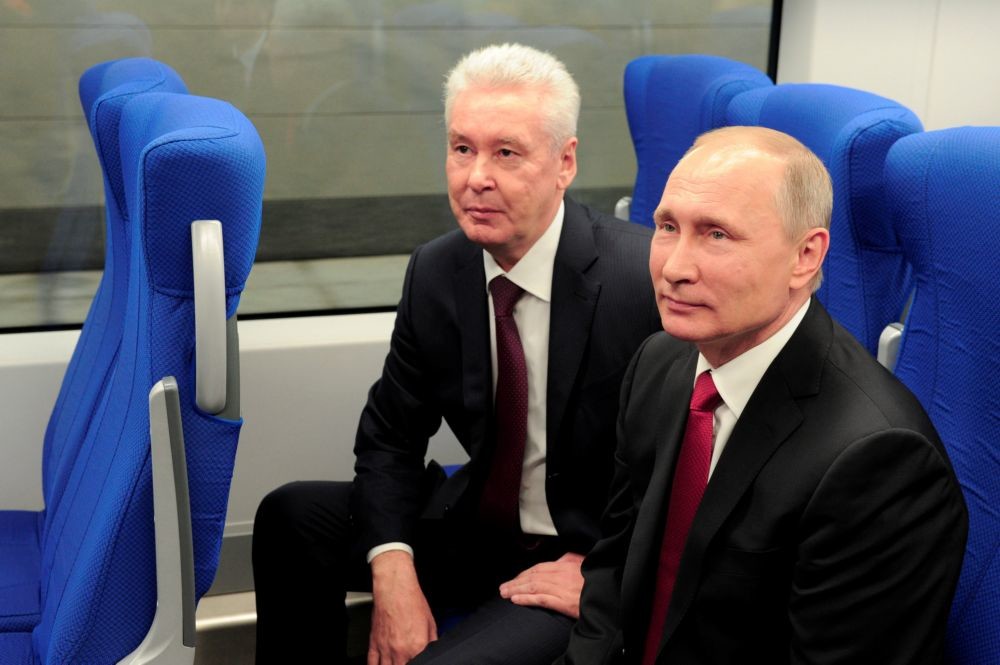  普京（右）和莫斯科市市長索比亞寧。 （湯森路透） 