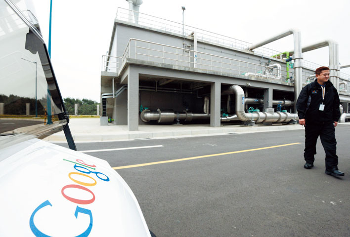 A security staff patrols the Google data center in Changhua, central Taiwan, on December 11, 2013. US search engine giant Google announced that it has decided to double its investment in Taiwan to $600 million while opening its first data centre in Asia cashing in on the robust demands. AFP PHOTO / Sam Yeh / AFP / SAM YEH