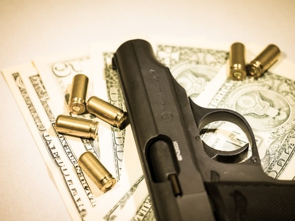 money-pistol-cartridges-bank-note-crime